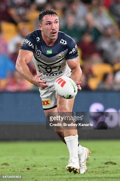 Reece Robson of the Cowboys passes the ball during the round two NRL match between the Brisbane Broncos and the North Queensland Cowboys at Suncorp...