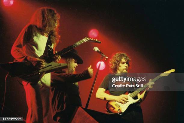 Allen Collins, Ronnie Van Zant and Steve Gaines of American rock band Lynyrd Skynyrd perform on stage at the Apollo Theatre on February 9th, 1977 in...