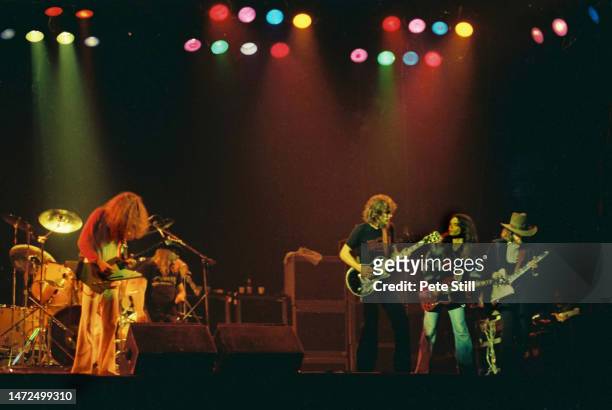 Allen Collins, Ronnie Van Zant, Steve Gaines, Gary Rossington and Leon Wilkeson of American rock band Lynyrd Skynyrd perform on stage at the Apollo...