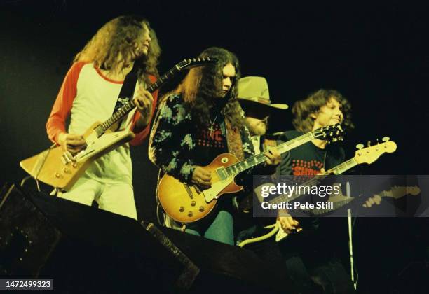 Allen Collins, Gary Rossington, Leon Wilkeson and Steve Gaines of American rock band Lynyrd Skynyrd perform on stage at the Apollo Theatre on...