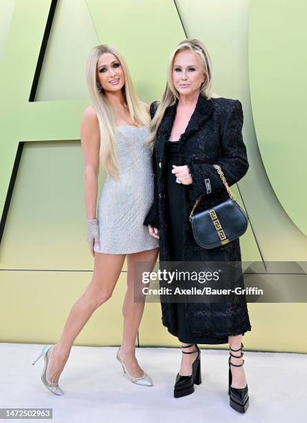 Nicky Hilton Rothschild, Paris Hilton and Kathy Hilton attend the Versace FW23 Show at Pacific Design Center on March 09, 2023 in West Hollywood,...