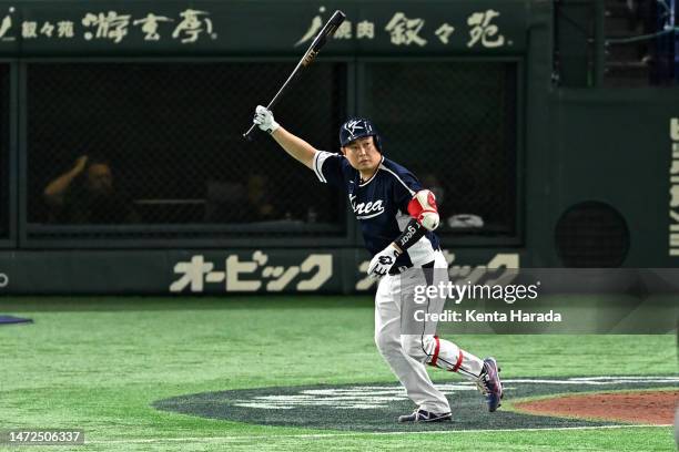 Euiji Yang of Korea celebrates hitting a two-run home run to make it 2-0 in the third inning during the World Baseball Classic Pool B game between...