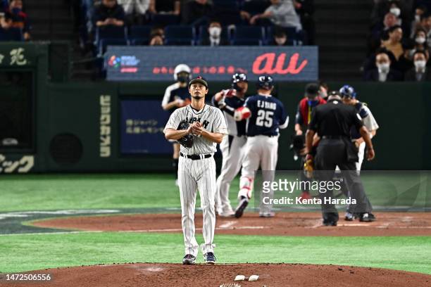 Yu Darvish of Japan reacts after allowing Euiji Yang of Korea a two-run home run to make it 2-0 in the third inning during the World Baseball Classic...