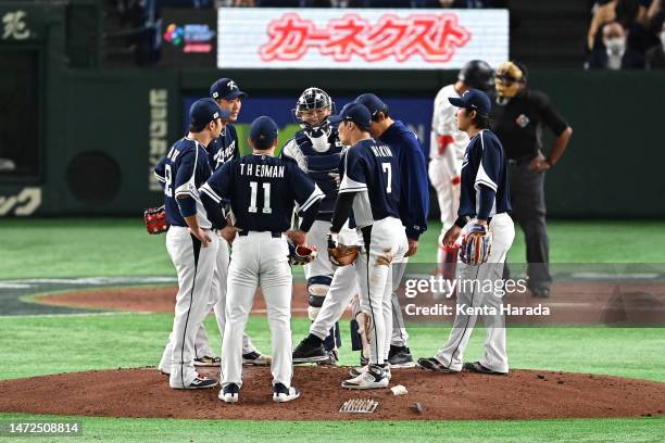 Korean players gather in the third inning during the World Baseball Classic Pool B game between Korea and Japan at Tokyo Dome on March 10, 2023 in...