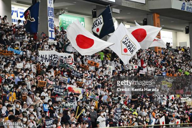 Japanese fans cheer in the third inning during the World Baseball Classic Pool B game between Korea and Japan at Tokyo Dome on March 10, 2023 in...