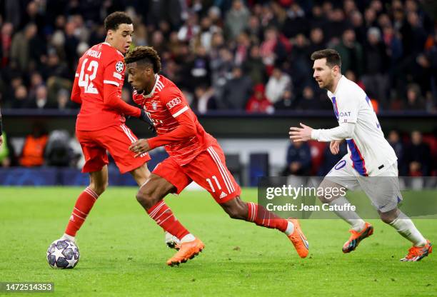 Kingsley Coman of Bayern Munich, Lionel Messi of PSG during the UEFA Champions League round of 16 leg two match between FC Bayern Munich and Paris...