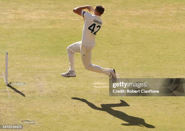 Cameron Green of Australia bowls during day two of the Fourth Test match in the series between India and Australia at Narendra Modi Stadium on March...