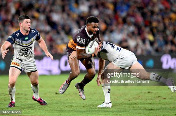 Ezra Mam of the Broncos takes on the defence during the round 2 NRL match between the Brisbane Broncos and the North Queensland Cowboys at Suncorp...