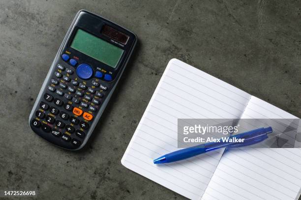 ballpoint pen on open notebook with calculator - agenda template stock pictures, royalty-free photos & images