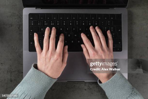 top down personal perspective view of person working on modern laptop computer. - personal perspective office stock pictures, royalty-free photos & images