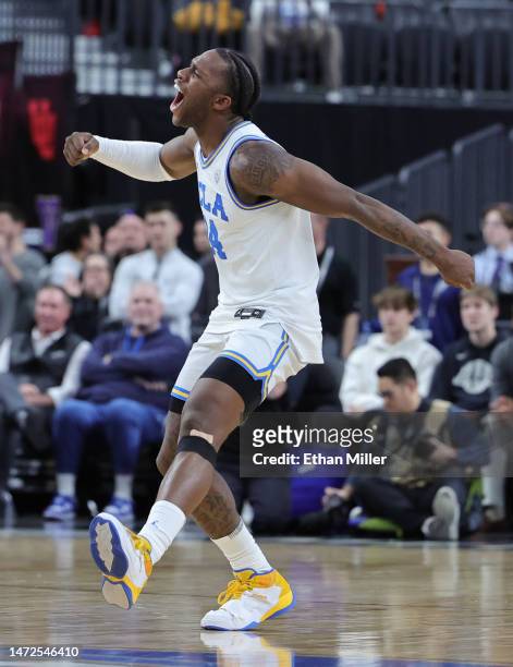 David Singleton of the UCLA Bruins celebrates after a quarterfinal game of the Pac-12 basketball tournament against the Colorado Buffaloes at...