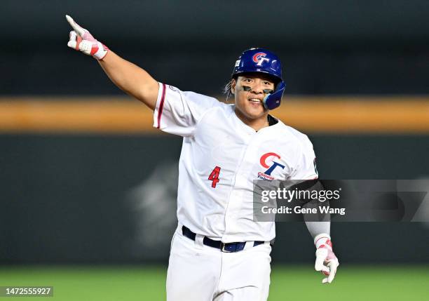 Kungkuan Giljegilaw of Chinese Taipei hits a three run homerun at the bottom of the 8th inning during the World Baseball Classic Pool A game between...