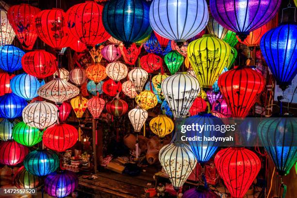 traditional silk hanging lanterns in hoi an city, vietnam - chinese lantern lily stock pictures, royalty-free photos & images