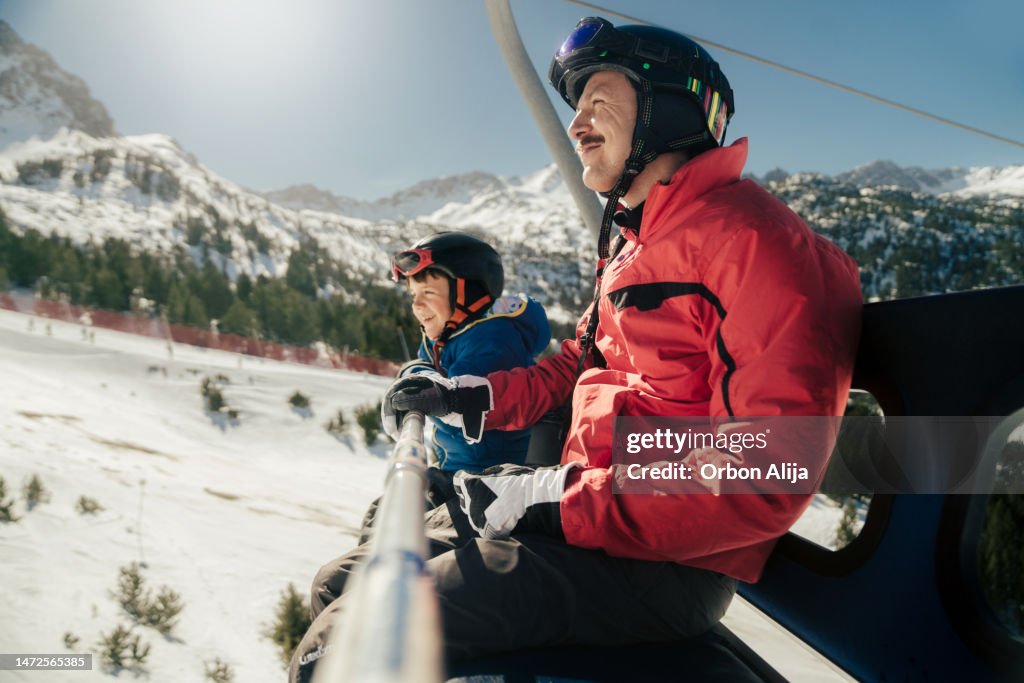 Father and son skiing