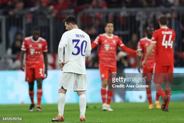 Lionel Messi of Paris Saint-Germain looks dejected after Serge Gnabry of FC Bayern Munich scores the team's second goal during the UEFA Champions...