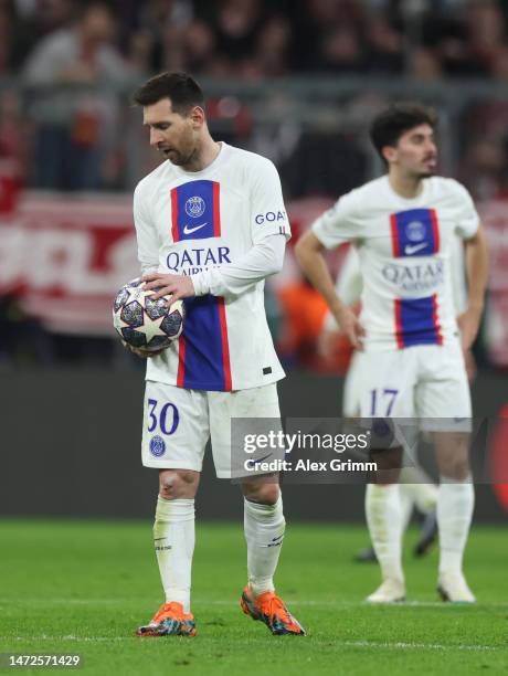 Lionel Messi of Paris Saint-Germain looks dejected after Serge Gnabry of FC Bayern Munich scores the team's second goal during the UEFA Champions...