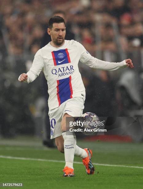 Lional Messi of Paris Saint-Germain controls the ball during the UEFA Champions League round of 16 leg two match between FC Bayern München and Paris...