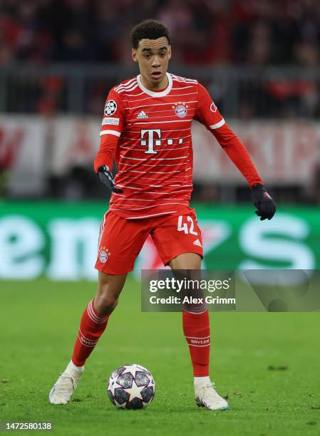 Jamal Musiala of Bayern Muenchen controls the ball during the UEFA Champions League round of 16 leg two match between FC Bayern München and Paris...