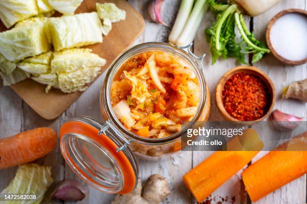 homemade kimchee and glass jar - kimchi stock pictures, royalty-free photos & images
