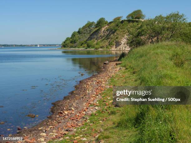 hiking at the baltic sea near flensburg,flensburg,germany - flensburg stock-fotos und bilder