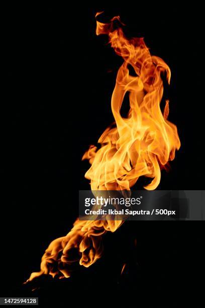 close-up of fire against black background - burning embers stock pictures, royalty-free photos & images