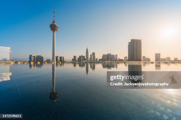 kuala lumpur cityscape reflection in malaysia - malaysia landmark stock pictures, royalty-free photos & images