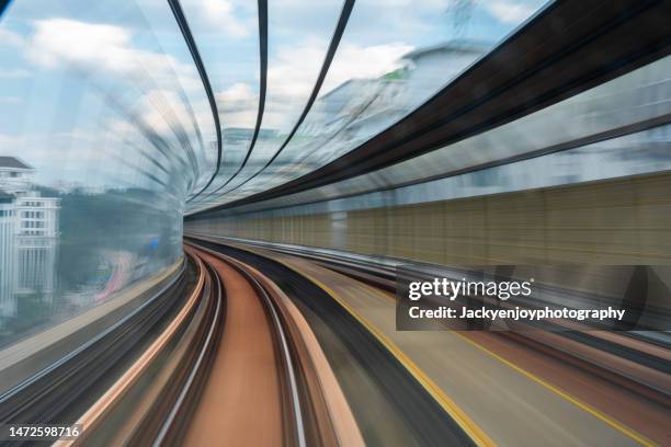 long exposure on kuala lumpur train, malaysia - monotrilho - fotografias e filmes do acervo