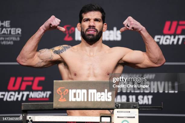 Raphael Assuncao of Brazil poses on the scale during the UFC Fight Night weigh-in at UFC APEX on March 10, 2023 in Las Vegas, Nevada.