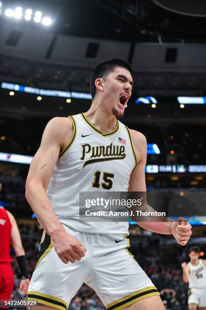 Zach Edey of the Purdue Boilermakers reacts after making a basket and getting fouled during the first half of a Big Ten Men's Basketball Tournament...