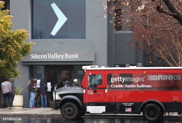 Brinks armored truck sits parked in front of the shuttered Silicon Valley Bank headquarters on March 10, 2023 in Santa Clara, California. Silicon...