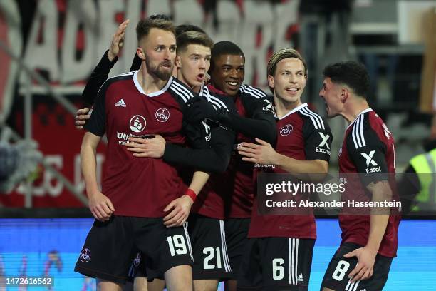 Florian Hübner of Nuernberg celebrates scoring the opning goal during the Second Bundesliga match between 1. FC Nürnberg and Eintracht Braunschweig...