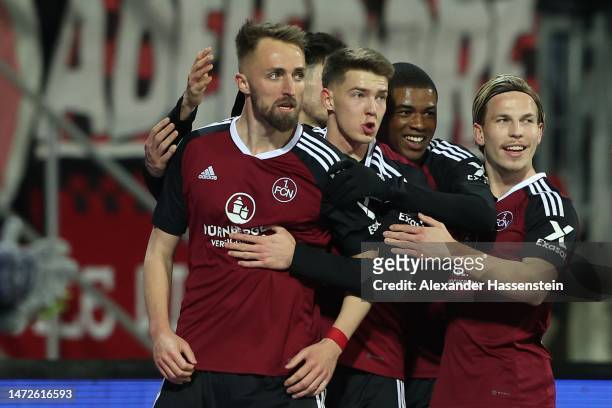 Florian Hübner of Nuernberg celebrates scoring the opning goal during the Second Bundesliga match between 1. FC Nürnberg and Eintracht Braunschweig...