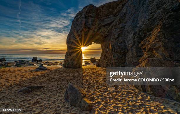 scenic view of beach against sky during sunset,france - quiberon fotografías e imágenes de stock