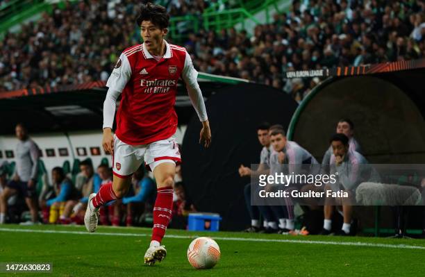 Takehiro Tomiyasu of Arsenal FC in action during the Round of 16 Leg One - UEFA Europa League match between Sporting CP and Arsenal FC at Estadio...