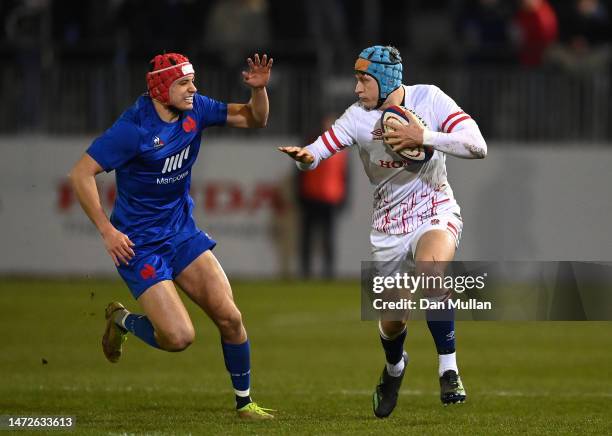 Josh Hathaway of England takes on Louis Bielle-Biarrey of France during the U20 Six Nations Rugby match between England and France at Recreation...