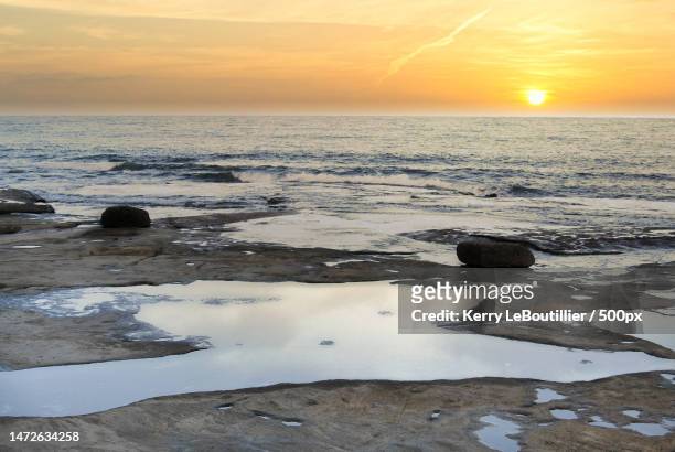 scenic view of sea against sky during sunset,caloundra,queensland,australia - caloundra stock pictures, royalty-free photos & images