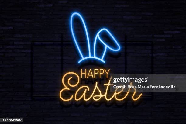 happy easter text in neon lights banner - egg icon stock pictures, royalty-free photos & images