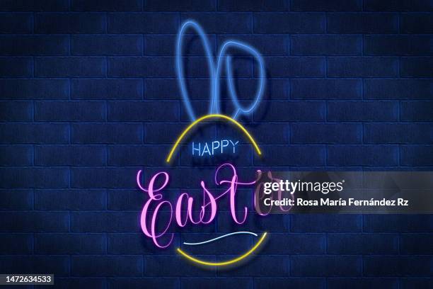 happy easter text in neon lights banner - egg icon stock pictures, royalty-free photos & images