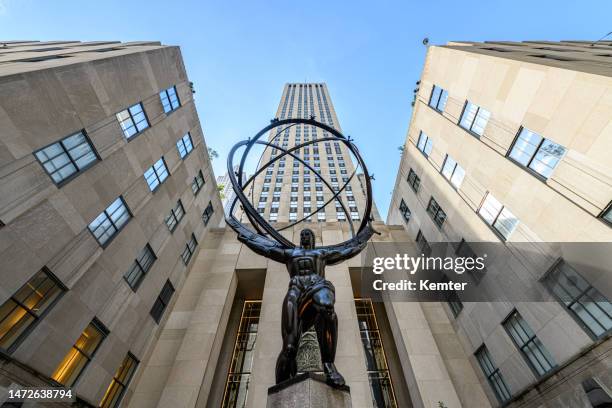 atlas statue at the rockefeller center - rockefeller center view stock pictures, royalty-free photos & images