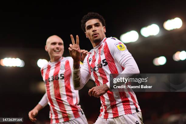 Ki-Jana Hoever of Stoke City celebrates with teammate Will Smallbone after scoring the team's second goal during the Sky Bet Championship between...