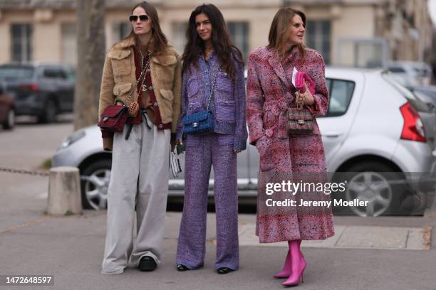 Carlotta Oddi seen wearing a teddy jacket, shades, a red and black patterned bag, grey wide leg pants, Chiara Totire seen wearing a tweed purple suit...