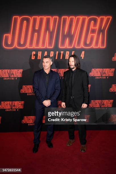 Chad Stahelski and Keanu Reeves attend the "John Wick 4" Premiere at Le Grand Rex on March 10, 2023 in Paris, France.