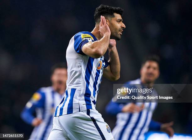 Mehdi Taremi of FC Porto celebrates after scoring his team's third goal during the Liga Portugal Bwin match between FC Porto and GD Estoril Praia at...