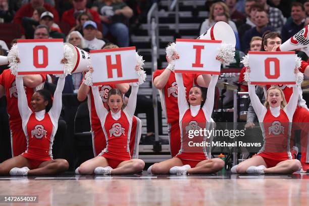 The Ohio State Buckeyes cheerleaders cheer during the second half in the quarterfinals of the Big Ten Tournament against the Michigan State Spartans...