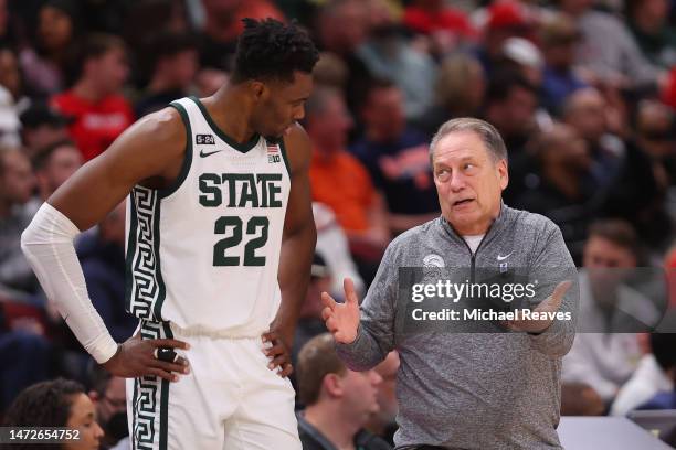 Head coach Tom Izzo of the Michigan State Spartans talks with Mady Sissoko against the Ohio State Buckeyes during the second half in the...