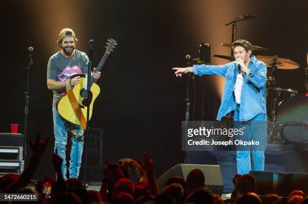 Thomas Rhett and Niall Horan perform on stage on day one of the C2C Country To Country 2023 Festival at The O2 Arena on March 10, 2023 in London,...