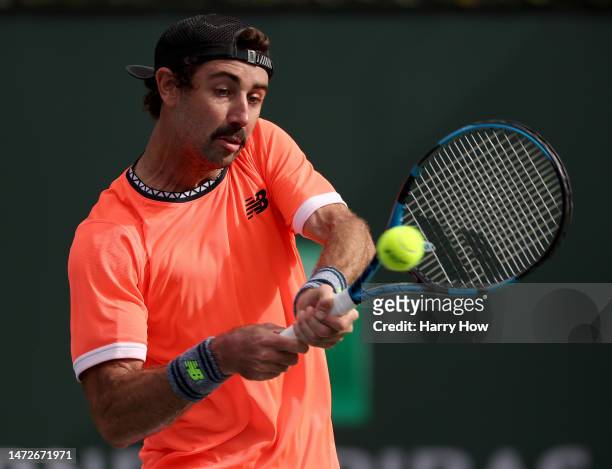Jordan Thompson of Australia plays a backhand in his victory over Stefanos Tsitsipas of Greece during the BNP Parisbas at the Indian Wells Tennis...