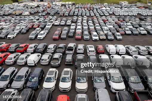 Fleet of vehicles parked in a car dealership Fleet of vehicles parked in a car dealership