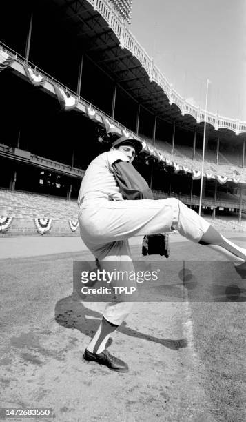 Pitcher Sandy Koufax of the Los Angeles Dodgers poses for a portrait in his windup during practice prior to Game 1 of the 1963 World Series at Yankee...