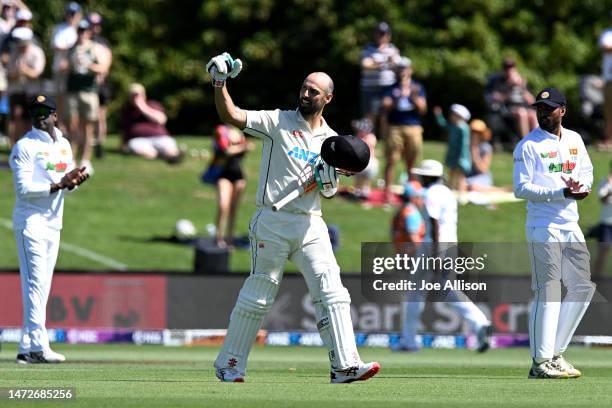 Daryl Mitchell of New Zealand celebrates after scoring a century during day three of the First Test match in the series between New Zealand and Sri...